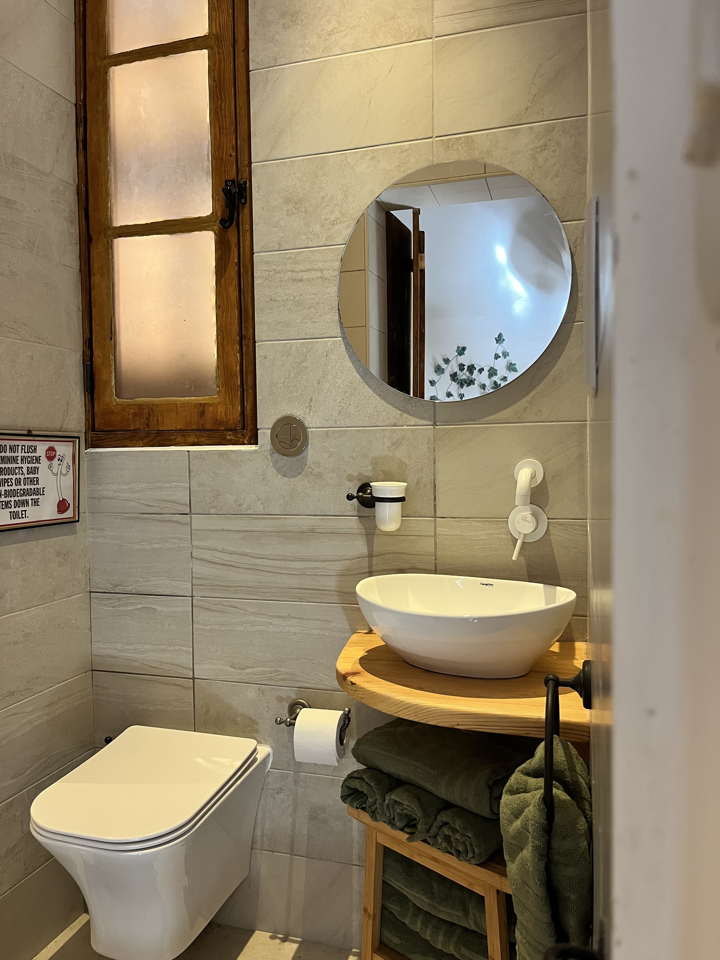 Bathroom with vessel sink at Magdalena restored holiday home Malta