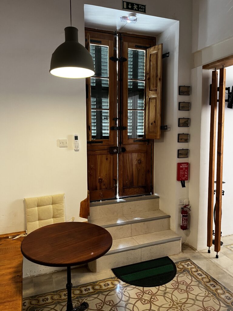 Entrance hall at Magdalena — restored limestone walls and encaustic tiles